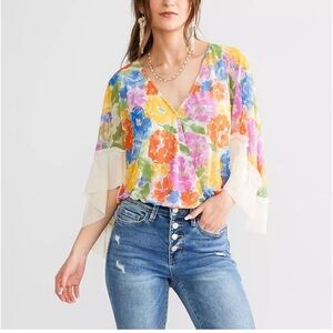 Willow & Root Floral Surplice Mesh Top
Size: X-Small nwt
